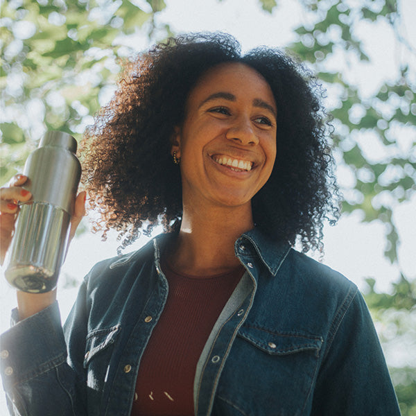 bring-your-own-party-kit-tumblers-and-cocktails-r9 16oz_rise_reflect_woman_smile_square.jpg