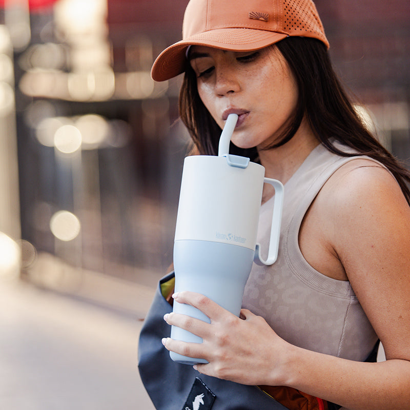 36oz-rise-tumbler-with-straw-lid-d4 36oz_rise_tumbler_straw_girl_sip_square.jpg