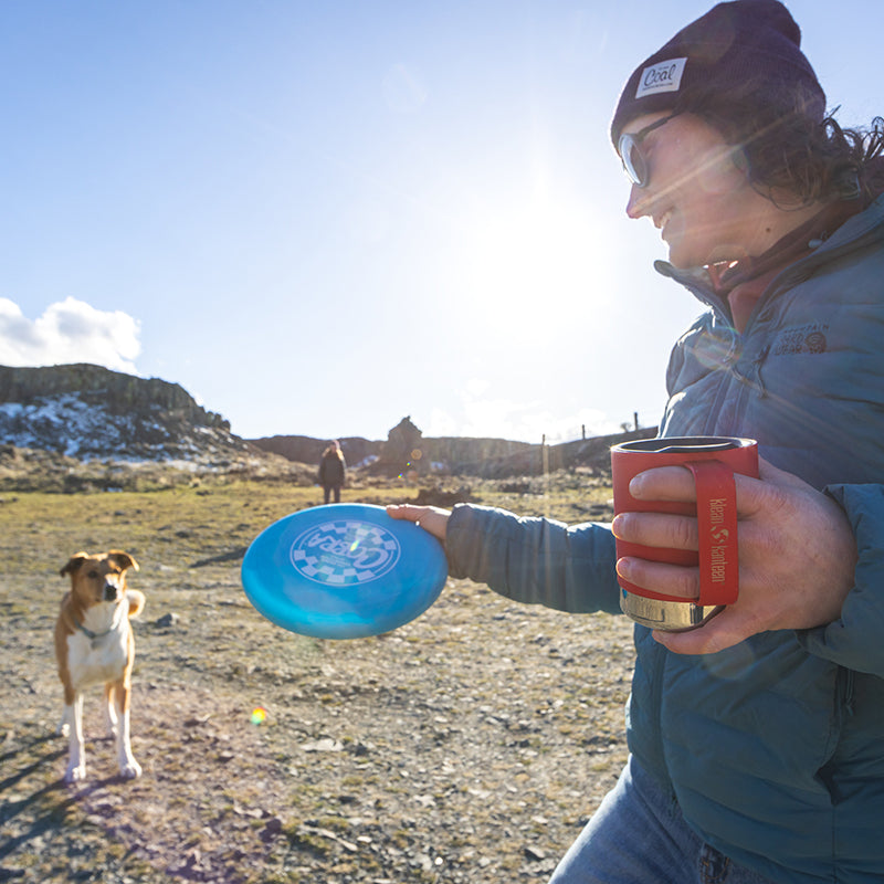 12oz-camp-mug-m9 insulated_camp_mug_12oz_woman_dog_frisbee_square.jpg